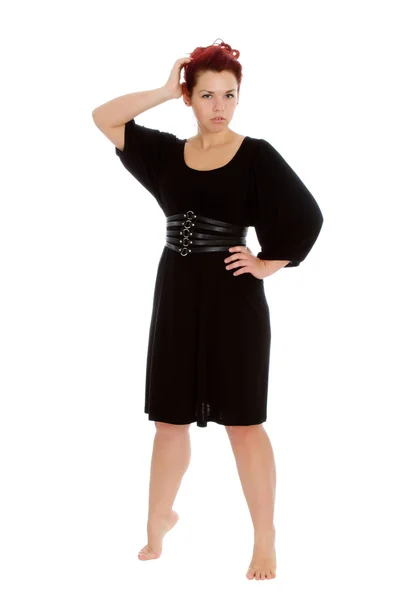 Jong meisje in zwarte jurk op witte backgroung — Stockfoto