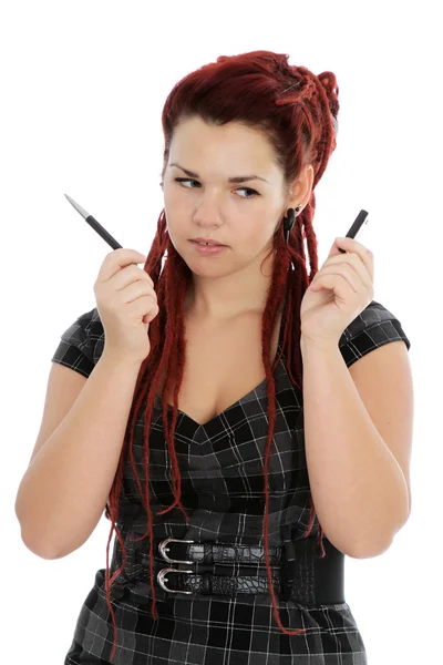 Beautiful young woman with pen — Stock Photo, Image