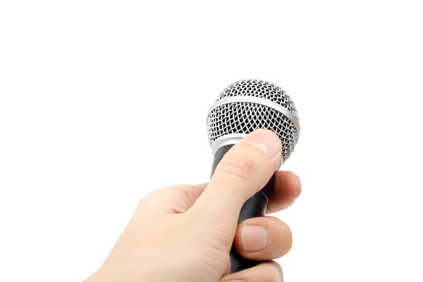 Hand mit Mikrofon isoliert auf weiß. — Stockfoto