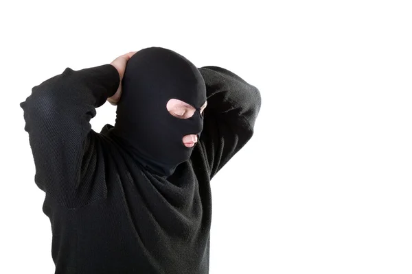 Arrested caucasian man in a black mask. — Stock Photo, Image