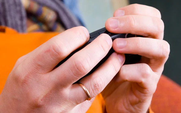 Hands with a smartphone — Stock Photo, Image
