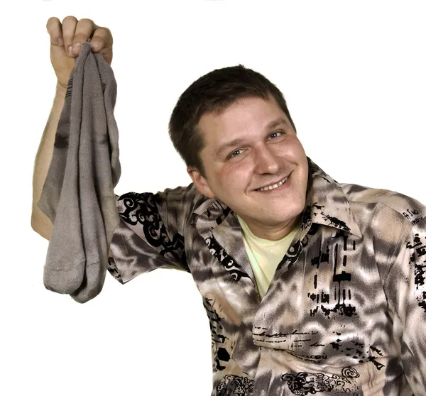 Homme souriant avec des chaussettes sales — Photo