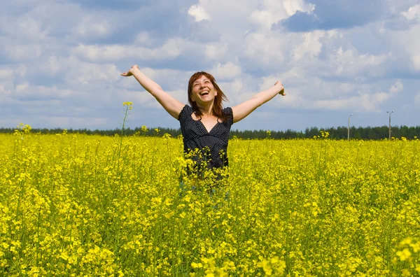 Happy girl in field Royalty Free Stock Images