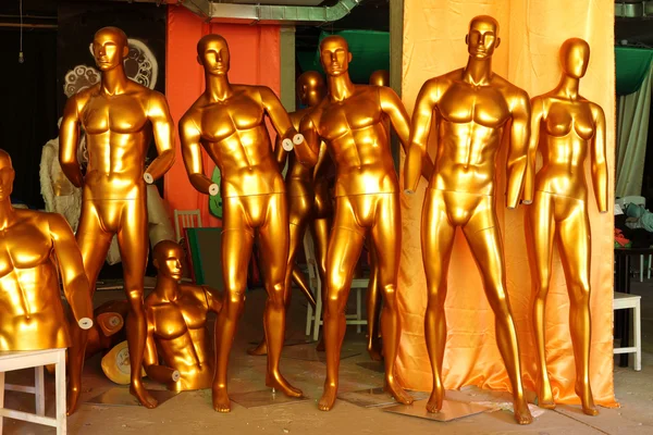 Gold mannequins — Stock Photo, Image