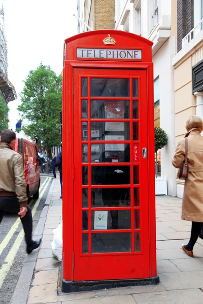 Traditional red telephone box in London, UK