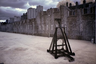 Battle catapult in The Tower of London, medieval castle and pris clipart