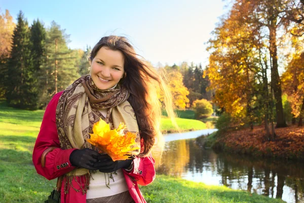 Girl with Bunch of Leaves — Stock Photo, Image