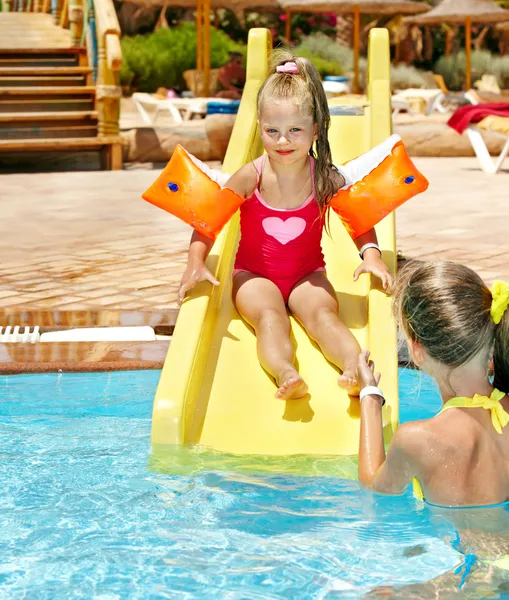Children on water slide at aquapark. — Stock Photo, Image