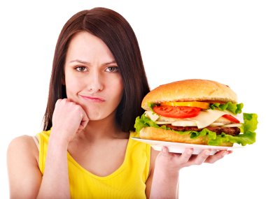 Woman holding hamburger. clipart