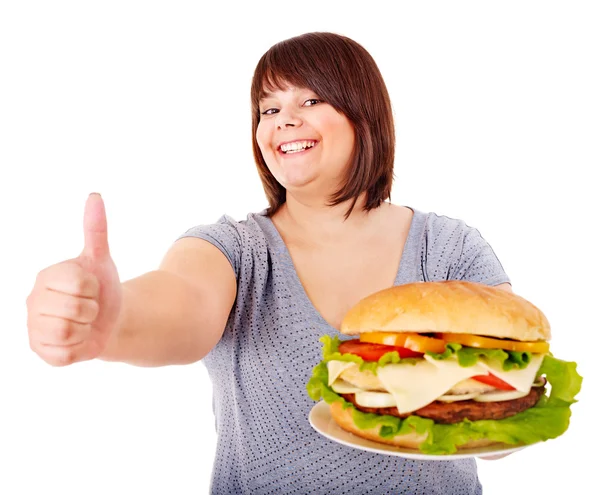Жінка їдять гамбургер . — стокове фото