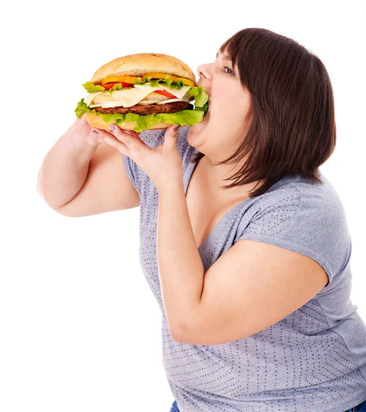 Женщина ест гамбургер . — стоковое фото