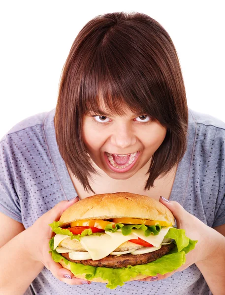Žena jíst hamburger. — Stock fotografie
