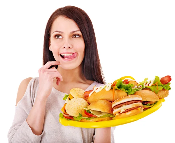 Vékony nő gazdaság hamburger. — Stock Fotó