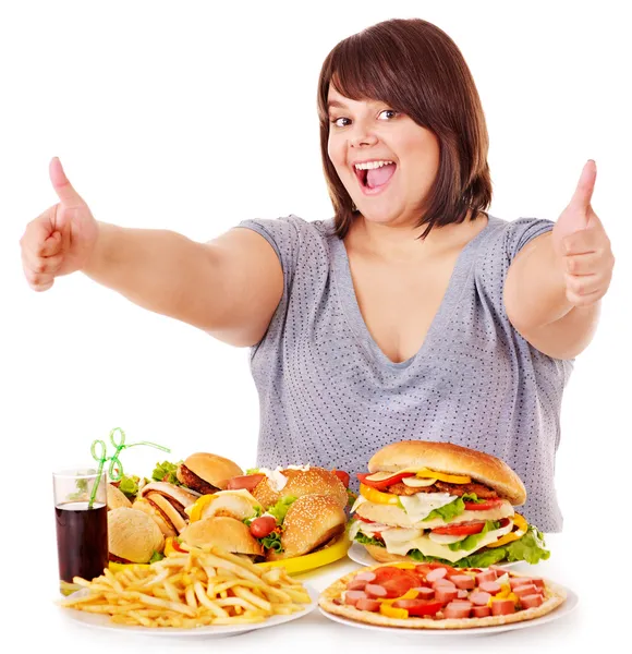 Donna che mangia fast food. — Foto Stock