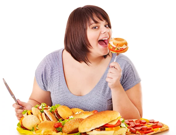 Vrouw eten Fast Food. — Stockfoto