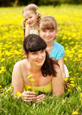 Mother with daughter in outdoor. clipart