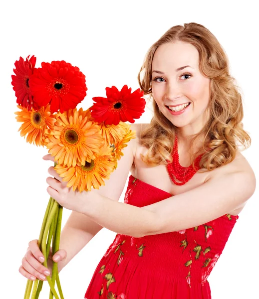 Glad ung kvinna anläggning blommor. — Stock fotografie