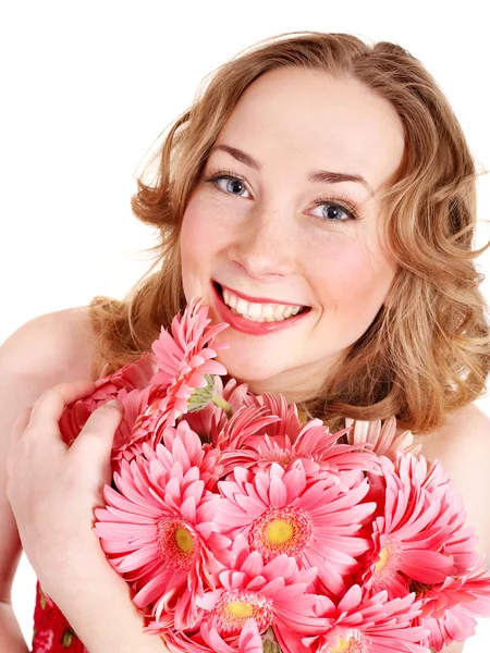 Νεαρή γυναίκα που βρίσκεται στα λουλούδια. — Φωτογραφία Αρχείου