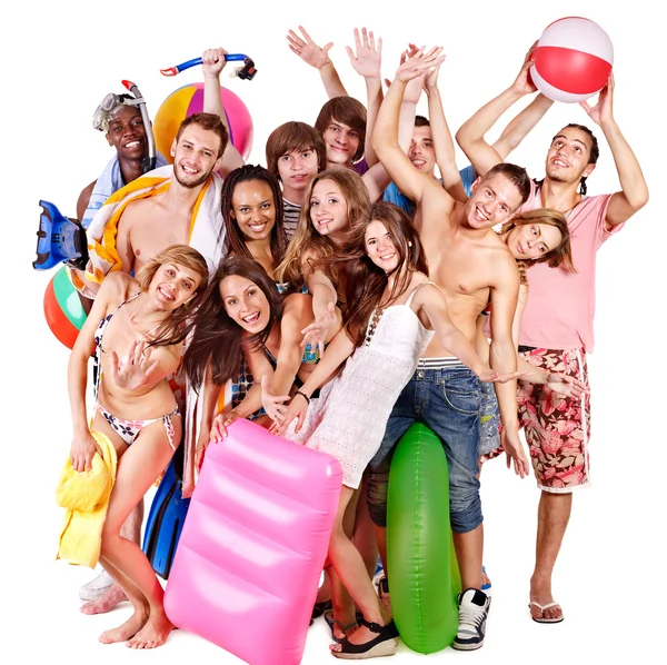 Skupina drží plážové Doplňky. — Stock fotografie