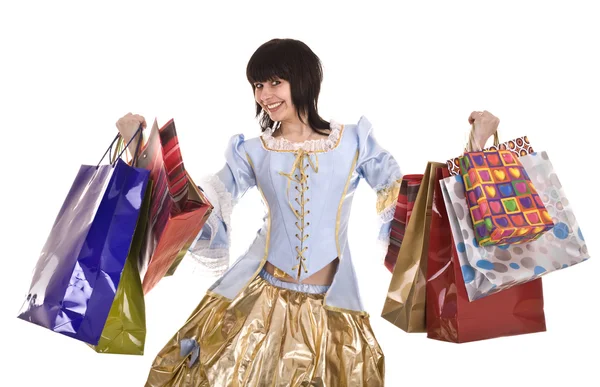 Woman in ancient dress with gift bag shopping. — Stock Photo, Image
