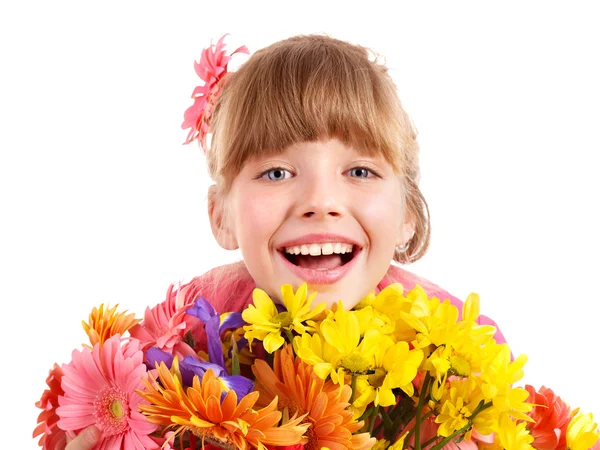 Gelukkig kind bedrijf bloemen. — Stockfoto