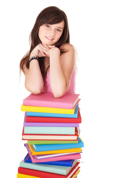 Meisje met stapel veelkleurige boek . — Stockfoto