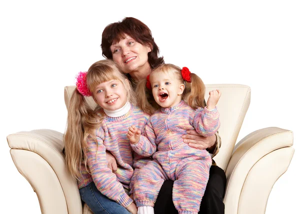 Lycklig mormor och två barnbarn. Stockfoto