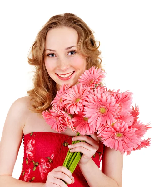 Joyeux jeune femme tenant des fleurs . — Photo