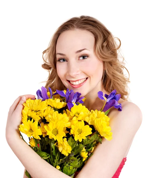Mujer joven sosteniendo flores. — Foto de Stock
