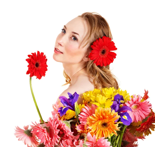 Mladá žena hospodářství květ. — Stock fotografie