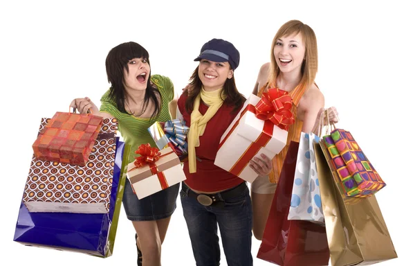 Three beautiful girlfriends enjoy shopping. Isolated. — Stock Photo, Image