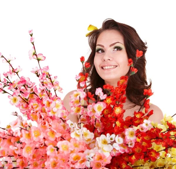 Vrouw met voorjaar bloem en vlinder. — Stockfoto