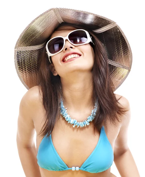 Girl in bikini and sunglasses on beach. — Stock Photo, Image
