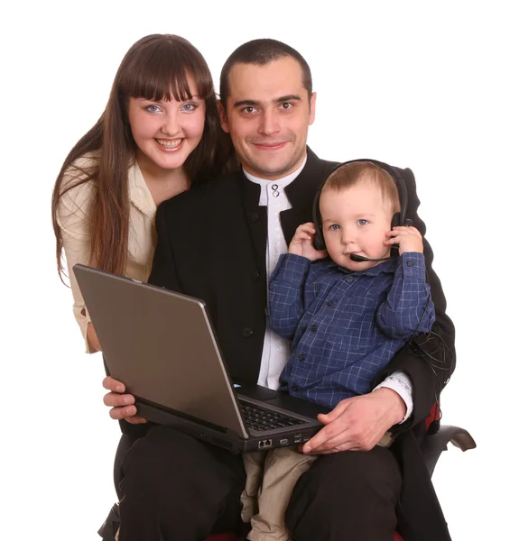 Boldog család laptop és fülhallgató. — Stock Fotó