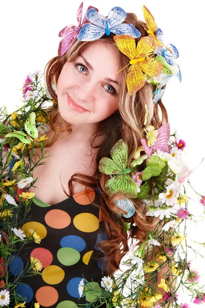 Meisje met butterfly en flower op hoofd. voorjaar haar. — Stockfoto