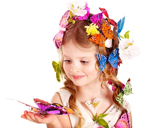Dítě v jarní účes a motýl. — Stock fotografie