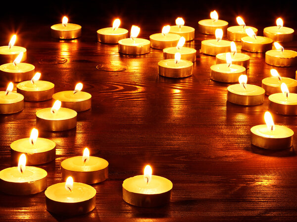 Group of burning candles.