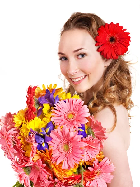 Jovem mulher segurando flores. — Fotografia de Stock