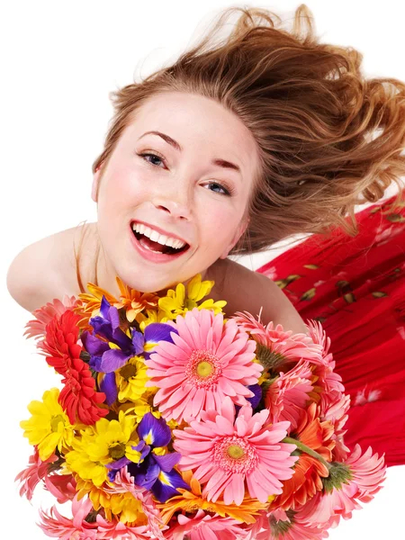 Joyeux jeune femme tenant des fleurs . — Photo