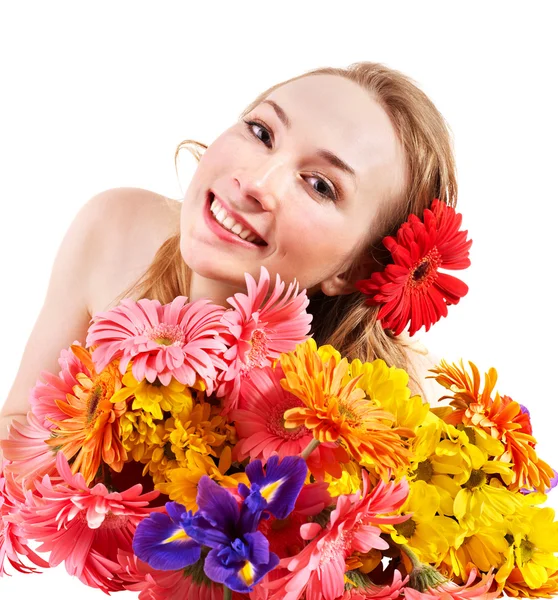 Glückliche junge Frau mit Blumen. — Stockfoto