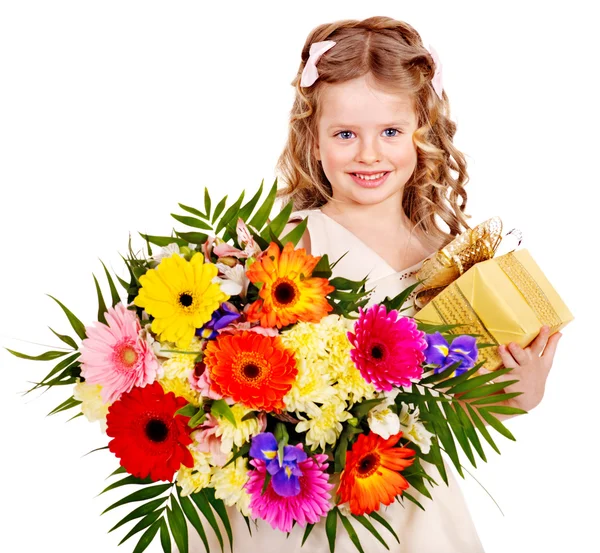 Child with spring flower and gift box. — Stock Photo, Image