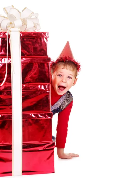 Kid with stack gift box. — Stock Photo, Image
