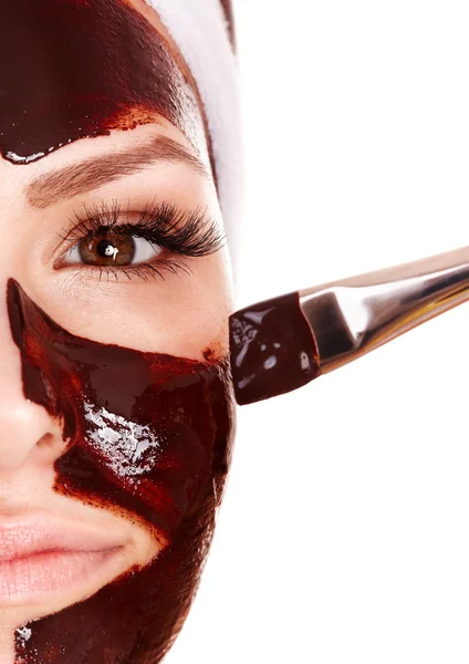 Girl having chocolate facial mask. — Stock Photo, Image