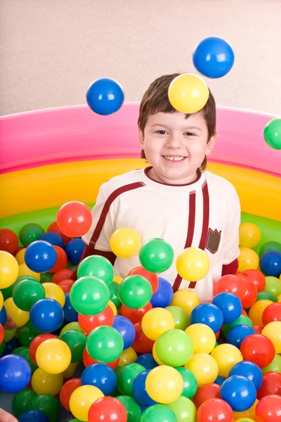 Födelsedag av pojken i färg bollar. — Stockfoto