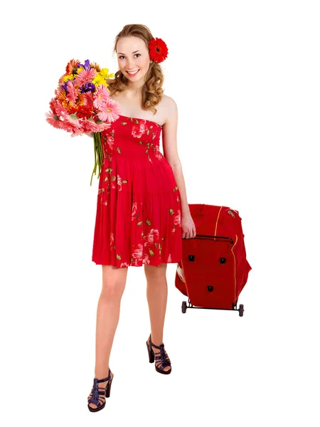Traveling young woman with wheeled luggage Royalty Free Stock Photos