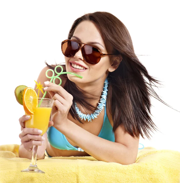 Girl in bikini drink juice through straw. Stock Picture