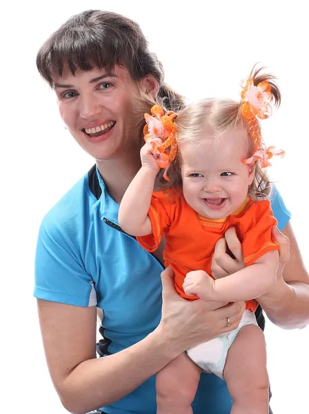 A happy mother holds a baby on hands. — Stock Photo, Image