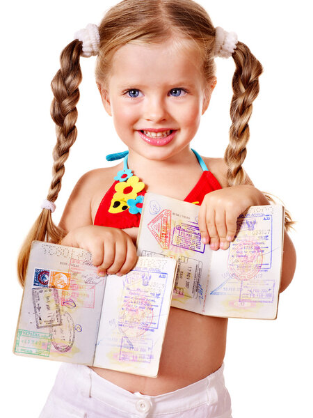 Child holding international passport.