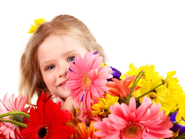 Joyeux enfant tenant des fleurs . — Photo