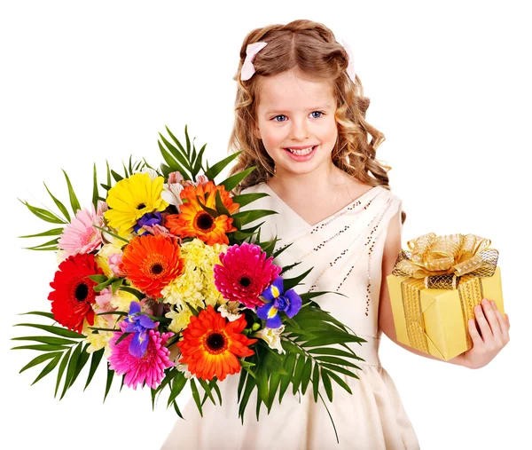 Child with spring flower and gift box. — Stock Photo, Image